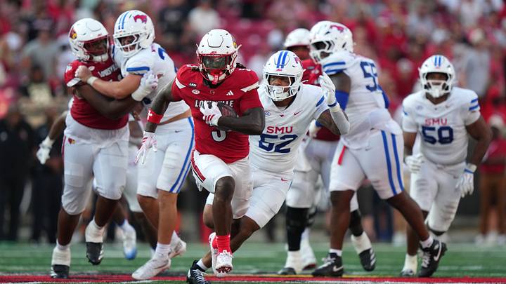 Louisville Cardinals running back Keyjuan Brown (5) carries the ball against the Southern Methodist Mustangs during the fourth quarter. Louisville Cardinals running back Keyjuan Brown (5) carries the ball against the Southern Methodist Mustangs during the fourth quarter.