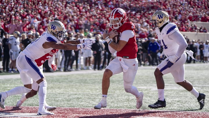 Oct 26, 2024; Bloomington, Indiana, USA; Indiana Hoosiers quarterback Tayven Jackson (2) runs the ball for a touchdown during the fourth quarter against the Washington Huskies at Memorial Stadium. Mandatory Credit: Jacob Musselman-Imagn Images