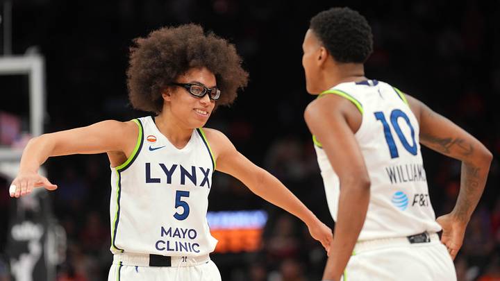 Jun 1, 2026; Phoenix, Arizona, USA; Minnesota Lynx guard Olivia Miles (5) and Minnesota Lynx guard Courtney Williams (10) slap hands during the second half of the game against the Phoenix Mercury at Mortgage Matchup Center. Mandatory Credit: Joe Camporeale-Imagn Images