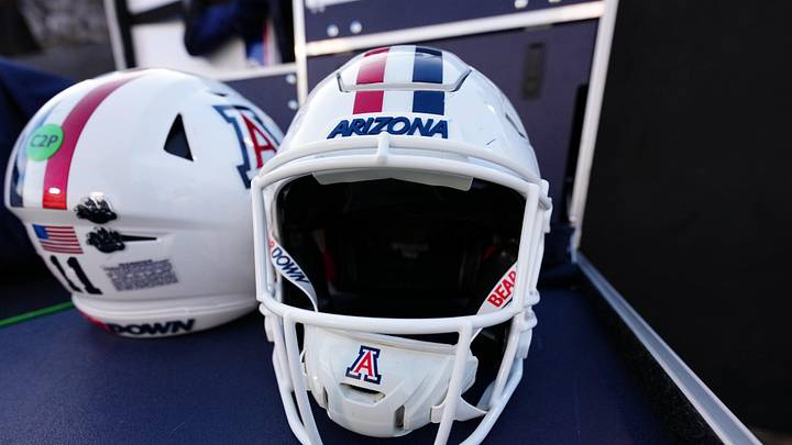 Nov 1, 2025; Boulder, Colorado, USA; General view of Arizona Wildcats helmets before the game against the Colorado Buffaloes at Folsom Field. Mandatory Credit: Ron Chenoy-Imagn Images