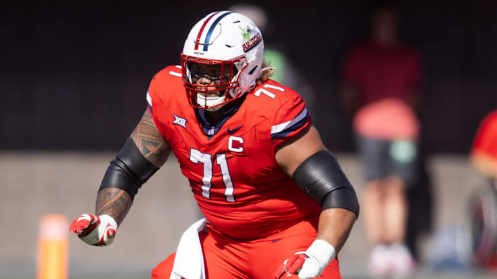 Oct 19, 2024; Tucson, Arizona, USA; Arizona Wildcats offensive lineman Jonah Savaiinaea (71) against the Colorado Buffalos at Arizona Stadium. Mandatory Credit: Mark J. Rebilas-Imagn Images Oct 19, 2024; Tucson, Arizona, USA; Arizona Wildcats offensive lineman Jonah Savaiinaea (71) against the Colorado Buffalos at Arizona Stadium. Mandatory Credit: Mark J. Rebilas-Imagn Images