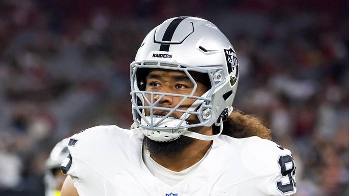 Aug 23, 2025; Glendale, Arizona, USA; Las Vegas Raiders defensive tackle Leki Fotu (95) against the Arizona Cardinals during a preseason NFL game at State Farm Stadium. Mandatory Credit: Mark J. Rebilas-Imagn Images