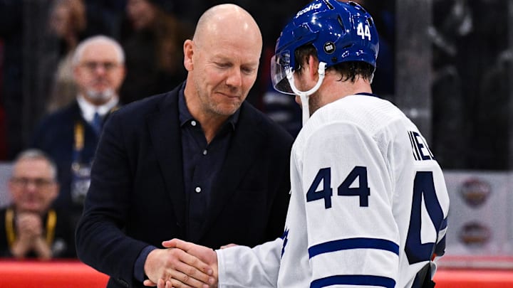 Nov 19, 2023; Stockholm, SWE; Mats Sundin greets Toronto Maple Leafs defenseman Morgan Rielly (44) during a Global Series NHL hockey game between the Toronto Maple Leafs and the Minnesota Wild at Avicii Arena. Mandatory Credit: Per Haljestam-Imagn Images