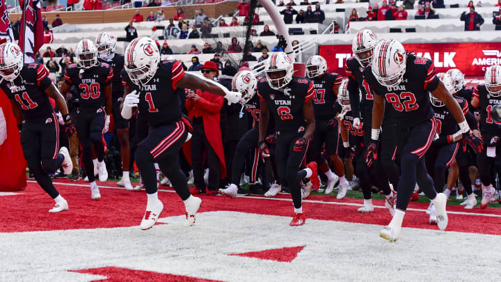 Nov 25, 2023; Salt Lake City, Utah, USA; Utah Utes run onto the field against the Colorado Buffaloes at Rice-Eccles Stadium. Mandatory Credit: Christopher Creveling-USA TODAY Sports