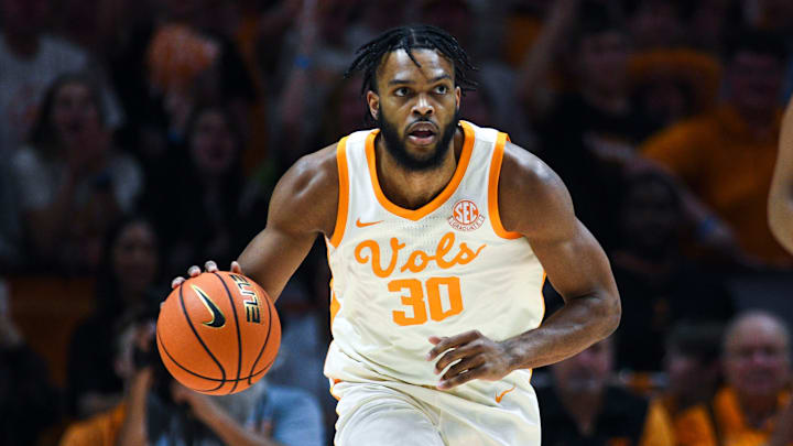 Tennessee guard Josiah-Jordan James (30) dribbles the ball during a NCAA game at Thompson-Boling Arena at Food City Center in Knoxville, Wednesday, Feb. 28, 2024. Tennessee won 92-84 against Auburn. Tennessee guard Josiah-Jordan James (30) dribbles the ball during a NCAA game at Thompson-Boling Arena at Food City Center in Knoxville, Wednesday, Feb. 28, 2024. Tennessee won 92-84 against Auburn.