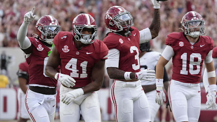 Oct 4, 2025; Tuscaloosa, Alabama, USA;  Alabama defensive back Keon Sabb (3) celebrates his interception with teammates Alabama linebacker Nikhai Hill-Green (41) and Alabama defensive back Bray Hubbard (18) at Saban Field at Bryant-Denny Stadium. Alabama downed Vanderbilt 30-14. Mandatory Credit: Gary Cosby Jr.-Imagn Images