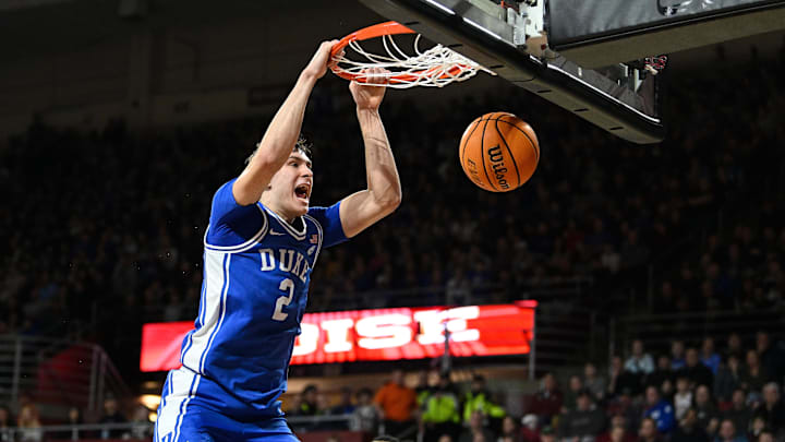 Jan 18, 2025; Chestnut Hill, Massachusetts, USA; Duke Blue Devils guard Cooper Flagg (2) dunks the ball against the Boston College Eagles during the first half at Conte Forum. Mandatory Credit: Eric Canha-Imagn Images