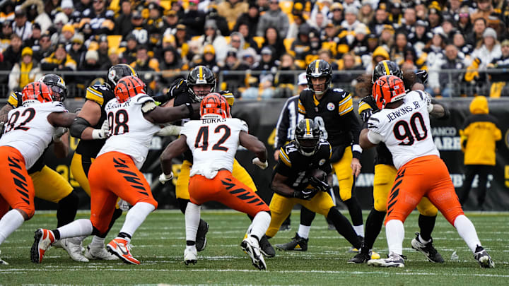 Bengals defense rushes the ball carrier during their game against the Steelers on Sunday November 16, 2025 at Acrisure Stadium.