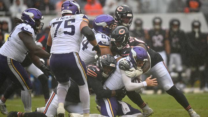 Chicago Bears defensive end Dayo Odeyingbo (55) and defensive tackle Kentavius Street (93) sack Minnesota Vikings quarterback Carson Wentz (11) during the second half at Soldier Field. Mandatory Credit: Patrick Gorski-Imagn Images Chicago Bears defensive end Dayo Odeyingbo (55) and defensive tackle Kentavius Street (93) sack Minnesota Vikings quarterback Carson Wentz (11) during the second half at Soldier Field. Mandatory Credit: Patrick Gorski-Imagn Images