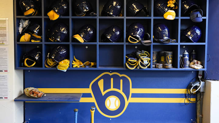 Sep 17, 2024; Milwaukee, Wisconsin, USA;  General view of batting helmets inside the Milwaukee Brewers dugout prior to the game against the Philadelphia Phillies at American Family Field. Mandatory Credit: Jeff Hanisch-Imagn Images