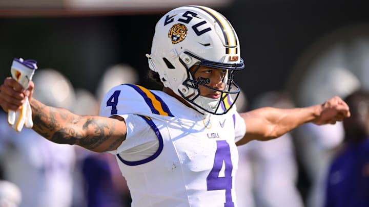 Oct 18, 2025; Nashville, Tennessee, USA;  Louisiana State Tigers wide receiver Nic Anderson (4) stretches against the Vanderbilt Commodores during pre-game warmups at FirstBank Stadium. Mandatory Credit: Steve Roberts-Imagn Images
