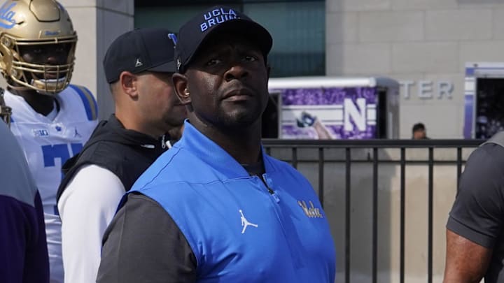 Sep 27, 2025; Evanston, Illinois, USA; UCLA Bruins interim head coach Tim Skipper takes the field against the Northwestern Wildcats during the first half at Northwestern Medicine Field at Martin Stadium. Mandatory Credit: David Banks-Imagn Images