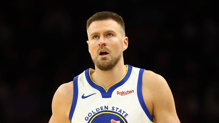 Apr 17, 2026; Phoenix, Arizona, USA; Golden State Warriors center Kristaps Porzingis (7) against the Phoenix Suns during the play-in rounds of the 2026 NBA Playoffs at Mortgage Matchup Center. Mandatory Credit: Mark J. Rebilas-Imagn Images