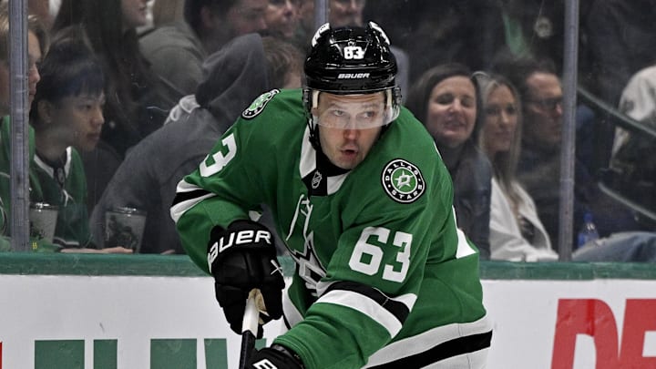 Apr 5, 2025; Dallas, Texas, USA; Dallas Stars right wing Evgenii Dadonov (63) skates with the puck against the Pittsburgh Penguins during the first period at the American Airlines Center. Mandatory Credit: Jerome Miron-Imagn Images