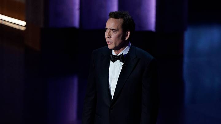 Mar 10, 2024; Los Angeles, CA, USA; Nicolas Cage presents the award for best actor in a leading role during the 96th Oscars at the Dolby Theatre at Ovation Hollywood in Los Angeles on Sunday, March 10, 2024.. Mandatory Credit: Jack Gruber-USA TODAY