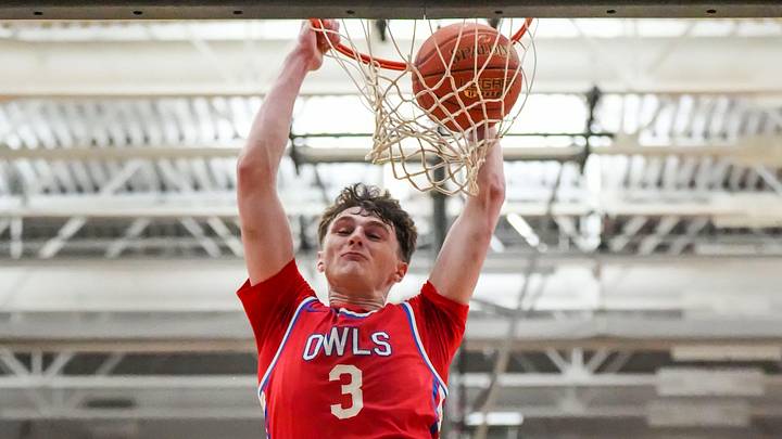 Slinger's Jack Kohnen (3) dunks during the WIAA D2 sectional semifinal game against Port Washington at Cedarburg High School in Cedarburg, Wisconsin, March 12, 2026. Slinger won the game, 62-33. Slinger's Jack Kohnen (3) dunks during the WIAA D2 sectional semifinal game against Port Washington at Cedarburg High School in Cedarburg, Wisconsin, March 12, 2026. Slinger won the game, 62-33.