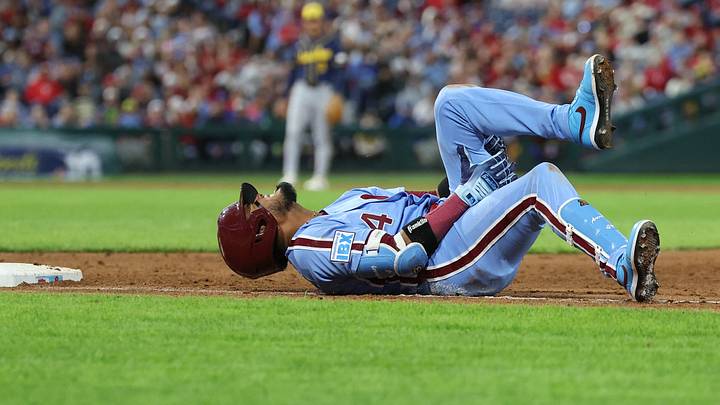 Sep 24, 2026; Philadelphia, Pennsylvania, USA; Philadelphia Phillies second baseman Luis Arraez (4) grabs his leg with an apparent injury while running to first base during the sixth inning against the Milwaukee Brewers at Citizens Bank Park. Mandatory Credit: Bill Streicher-Imagn Images Sep 24, 2026; Philadelphia, Pennsylvania, USA; Philadelphia Phillies second baseman Luis Arraez (4) grabs his leg with an apparent injury while running to first base during the sixth inning against the Milwaukee Brewers at Citizens Bank Park. Mandatory Credit: Bill Streicher-Imagn Images
