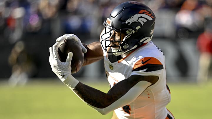 Nov 3, 2024; Baltimore, Maryland, USA; Denver Broncos wide receiver Courtland Sutton (14) catches a pass during the first half against the Baltimore Ravens at M&T Bank Stadium. Nov 3, 2024; Baltimore, Maryland, USA; Denver Broncos wide receiver Courtland Sutton (14) catches a pass during the first half against the Baltimore Ravens at M&T Bank Stadium.