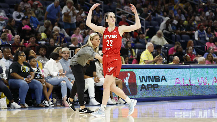 Aug 30, 2024; Chicago, Illinois, USA; Indiana Fever guard Caitlin Clark (22) reacts as she walks off the floor during the second half of a basketball game against the Chicago Sky at Wintrust Arena. Mandatory Credit: Kamil Krzaczynski-Imagn Images