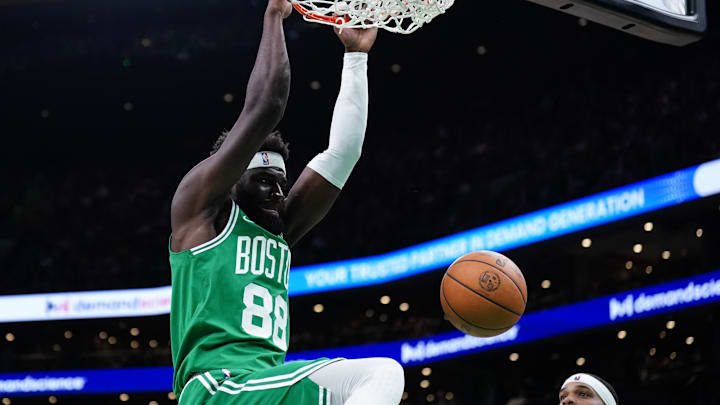 Apr 12, 2024; Boston, Massachusetts, USA; Boston Celtics center Neemias Queta (88) makes the basket against the Charlotte Hornets in the second quarter at TD Garden. Mandatory Credit: David Butler II-Imagn Images