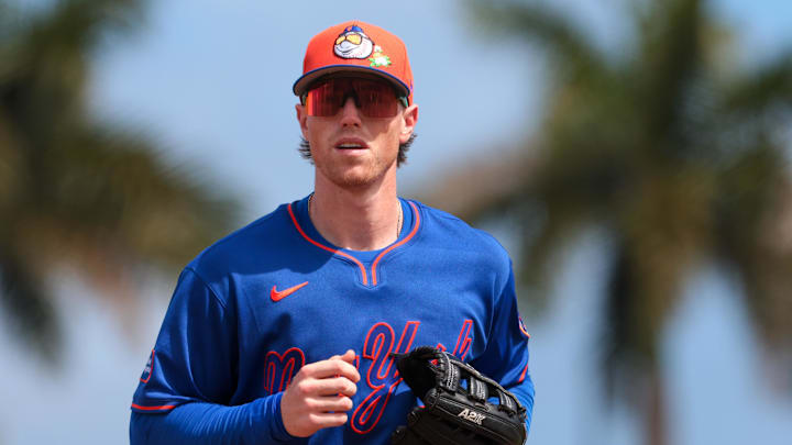 Mar 5, 2026; West Palm Beach, Florida, USA; New York Mets third baseman Brett Baty (7) returns to the dugout against the Washington Nationals during the first inning at CACTI Park of the Palm Beaches. Mandatory Credit: Sam Navarro-Imagn Images