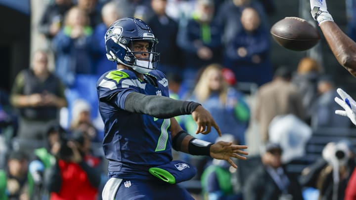 Oct 27, 2024; Seattle, Washington, USA; Seattle Seahawks quarterback Geno Smith (7) passes against the Buffalo Bills during the first quarter at Lumen Field. Mandatory Credit: Joe Nicholson-Imagn Images