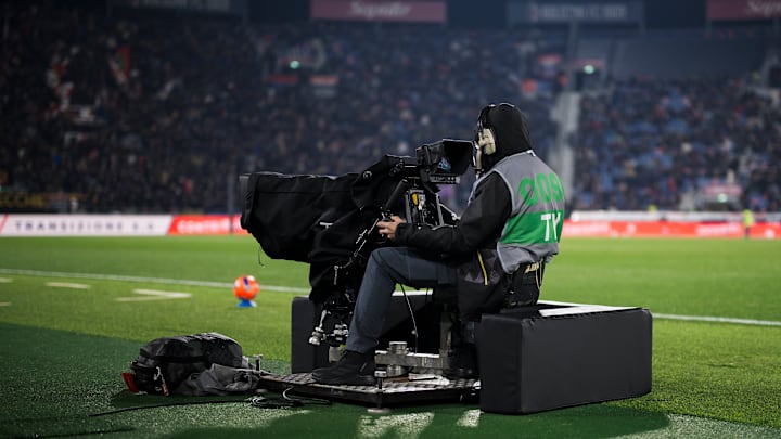 A cameraman works with a TV camera prior to the Serie A
