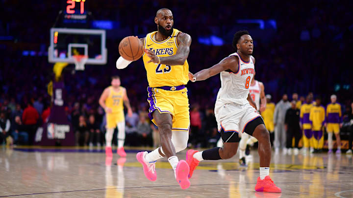Mar 6, 2025; Los Angeles, California, USA; Los Angeles Lakers forward LeBron James (23) passes the ball ahead of New York Knicks forward OG Anunoby (8) during the second half at Crypto.com Arena. Mandatory Credit: Gary A. Vasquez-Imagn Images Mar 6, 2025; Los Angeles, California, USA; Los Angeles Lakers forward LeBron James (23) passes the ball ahead of New York Knicks forward OG Anunoby (8) during the second half at Crypto.com Arena. Mandatory Credit: Gary A. Vasquez-Imagn Images