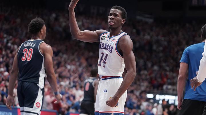 Kansas Jayhawks guard Melvin Council Jr. (14) throws up his hand after a shot against Arizona Wildcats during the game inside Allen Fieldhouse on Feb. 9, 2026. Kansas Jayhawks guard Melvin Council Jr. (14) throws up his hand after a shot against Arizona Wildcats during the game inside Allen Fieldhouse on Feb. 9, 2026.