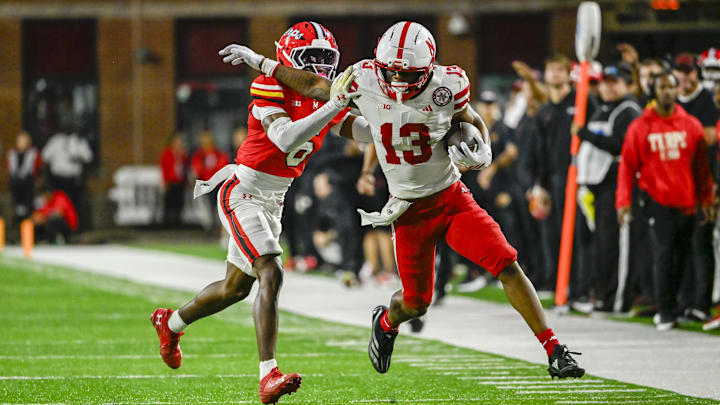 Nebraska wide receiver Nyziah Hunter runs for a first down as Maryland defensive back Dontay Joyner defends. Hunter scored two touchdowns in Huskers' victory.