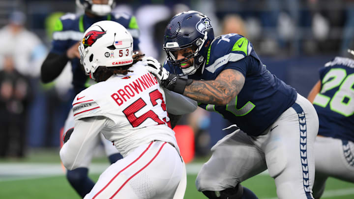 Nov 24, 2024; Seattle, Washington, USA; Seattle Seahawks offensive tackle Abraham Lucas (72) blocks Arizona Cardinals linebacker Baron Browning (53) during the second half at Lumen Field. Mandatory Credit: Steven Bisig-Imagn Images