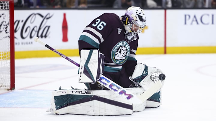 Mar 19, 2024; Anaheim, California, USA; Anaheim Ducks goaltender John Gibson (36) makes a save against the Minnesota Wild during the first period of a game at Honda Center. Mandatory Credit: Jessica Alcheh-Imagn Images