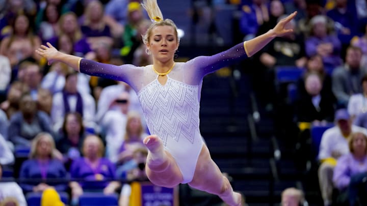 Lady Tigers senior Livvy Dunne performs a floor routine against the Arkansas Razorbacks at Pete Maravich Assembly Center. Lady Tigers senior Livvy Dunne performs a floor routine against the Arkansas Razorbacks at Pete Maravich Assembly Center.