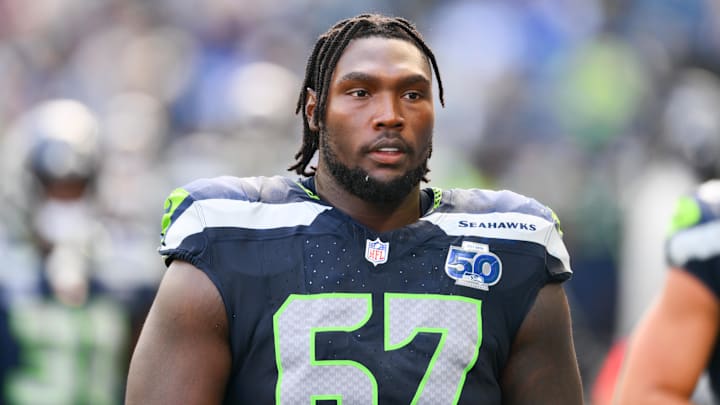 Seattle Seahawks offensive tackle Charles Cross (67) looks on from the sideline during the third quarter against the New Orleans Saints at Lumen Field. Seattle Seahawks offensive tackle Charles Cross (67) looks on from the sideline during the third quarter against the New Orleans Saints at Lumen Field.