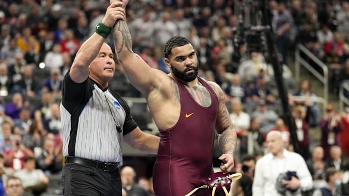 Mar 18, 2022; Detroit, MI, USA; Minnesota wrestler Gable Steveson celebrates after defeating Penn State wrestler Greg Kerkvliet (not pictured) in a 285 pound weight class semifinal match during the NCAA Wrestling Championships at Little Cesars Arena. Mandatory Credit: Raj Mehta-Imagn Images