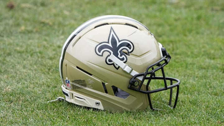Aug 14, 2025; Carson, CA, USA; A New Orleans Saints helmet on the field during a joint practice against the Los Angeles Rams at the Dignity Health Sports Park. Mandatory Credit: Kirby Lee-Imagn Images
