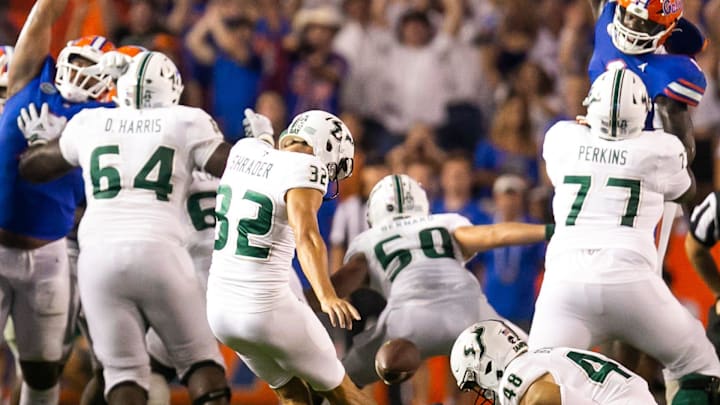 South Florida Bulls long snapper Andrew Beardall (48) bobbles the hold as South Florida Bulls place kicker Spencer Shrader (32) attempts to kick the game tying field goal in the second half against the Bulls at Steve Spurrier Field at Ben Hill Griffin Stadium in Gainesville, FL on Saturday, September 17, 2022. Florida won 31-28 [Doug Engle/Gainesville Sun]

Ncaa Football Florida Gators Vs Usf Bulls