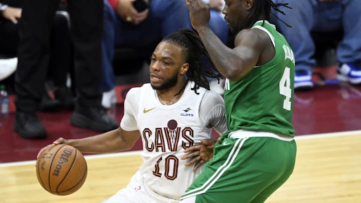 May 11, 2024; Cleveland, Ohio, USA; Cleveland Cavaliers guard Darius Garland (10) dribbles the ball against Boston Celtics guard Jrue Holiday (4) in the third quarter of game three of the second round of the 2024 NBA playoffs at Rocket Mortgage FieldHouse. Mandatory Credit: David Richard-USA TODAY Sports