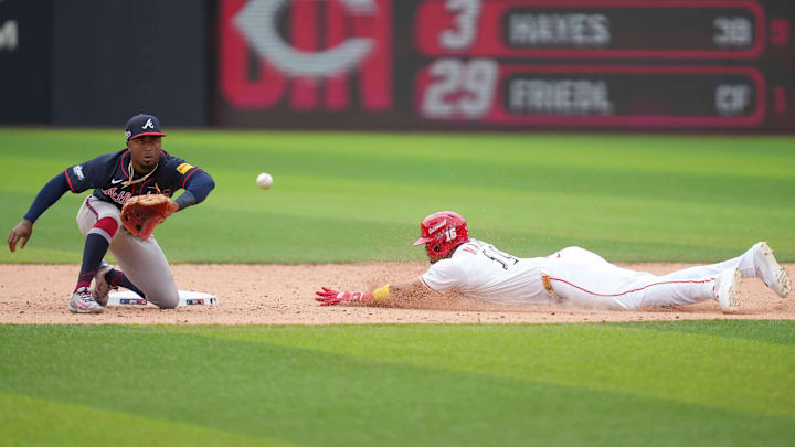 Cincinnati Reds outfielder Noelvi Marte (16) slides safely into second base as Atlanta Braves second baseman Ozzie Albies (1) fields the ball during a Major League Baseball game between the Atlanta Braves and Cincinnati Reds at Bristol Motor Speedway on August 3, 2025.