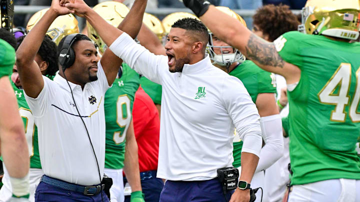 Sep 28, 2024; South Bend, Indiana, USA; Notre Dame Fighting Irish head coach Marcus Freeman reacts after a turnover on downs by the Louisville Cardinals in the second quarter at Notre Dame Stadium. Mandatory Credit: Matt Cashore-Imagn Images Sep 28, 2024; South Bend, Indiana, USA; Notre Dame Fighting Irish head coach Marcus Freeman reacts after a turnover on downs by the Louisville Cardinals in the second quarter at Notre Dame Stadium. Mandatory Credit: Matt Cashore-Imagn Images