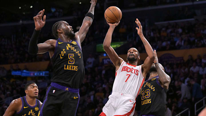 Apr 21, 2026; Los Angeles, California, USA; Houston Rockets forward Kevin Durant (7) is defended by Los Angeles Lakers center Deandre Ayton (5) as he drives to the basket during the second half of game two of the first round of the 2026 NBA Playoffs at Crypto.com Arena. Mandatory Credit: Jayne Kamin-Oncea-Imagn Images