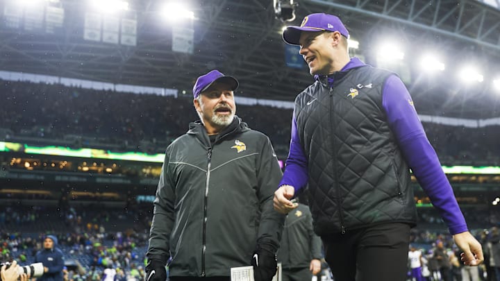Dec 22, 2024; Seattle, Washington, USA; Minnesota Vikings head coach Kevin O'Connell, right, and linebackers coach Mike Pettine, left, walk to the locker room following a victory against the Seattle Seahawks at Lumen Field.
