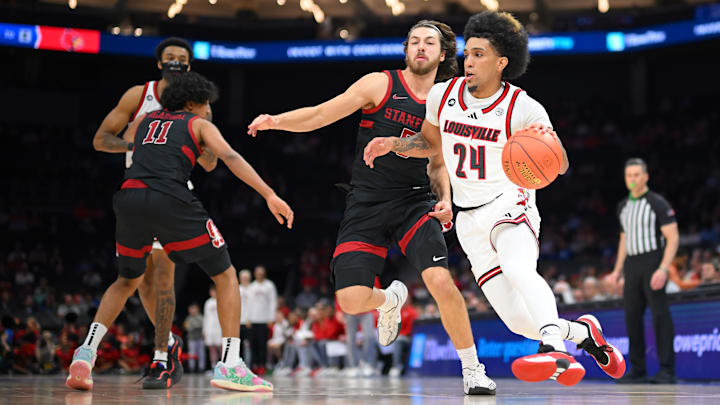 Louisville point guard Chucky Hepburn (24) Louisville point guard Chucky Hepburn (24)
