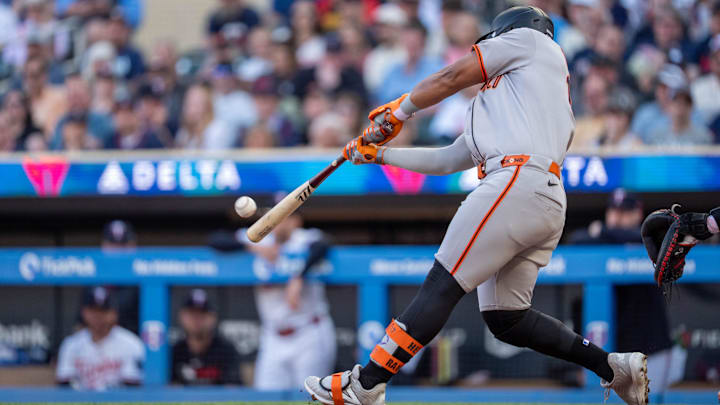 May 10, 2025; Minneapolis, Minnesota, USA; San Francisco Giants outfielder Heliot Ramos (17) hits a home run off the pitch from Minnesota Twins starting pitcher Joe Ryan (41) in the second inning at Target Field. May 10, 2025; Minneapolis, Minnesota, USA; San Francisco Giants outfielder Heliot Ramos (17) hits a home run off the pitch from Minnesota Twins starting pitcher Joe Ryan (41) in the second inning at Target Field.