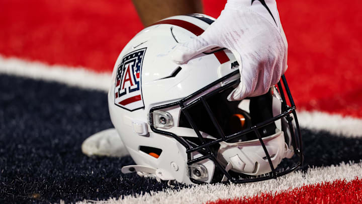 Oct 5, 2024; Tucson, Arizona, USA; Arizona Wildcats helmet gets picked before the game against the Texas Tech Red Raiders at Arizona Stadium. Mandatory Credit: Aryanna Frank-Imagn Images Oct 5, 2024; Tucson, Arizona, USA; Arizona Wildcats helmet gets picked before the game against the Texas Tech Red Raiders at Arizona Stadium. Mandatory Credit: Aryanna Frank-Imagn Images