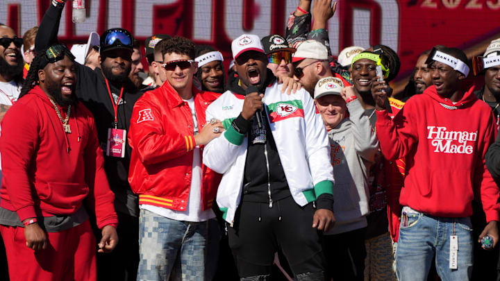 Feb 14, 2024; Kansas City, MO, USA;   Kansas City Chiefs defensive tackle Chris Jones (95) addresses the crowd on stage with quarterback Patrick Mahomes (15) during the celebration of the Kansas City Chiefs winning Super Bowl LVIII.  Mandatory Credit: Kirby Lee-Imagn Images