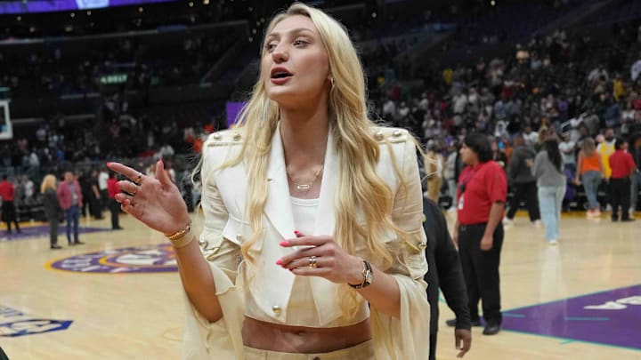 LA Sparks injured forward Cameron Brink leaves the floor after the game against the Las Vegas Aces at Crypto.com Arena.