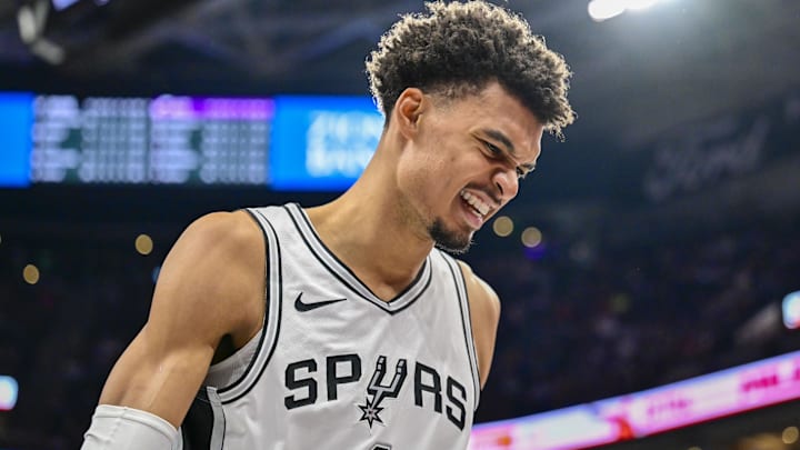 Nov 26, 2024; Salt Lake City, Utah, USA; San Antonio Spurs forward/center Victor Wembanyama (1) reacts after a collision with Utah Jazz forward/center Lauri Markkanen (not pictured) during the second half at Delta Center. Mandatory Credit: Christopher Creveling-Imagn Images