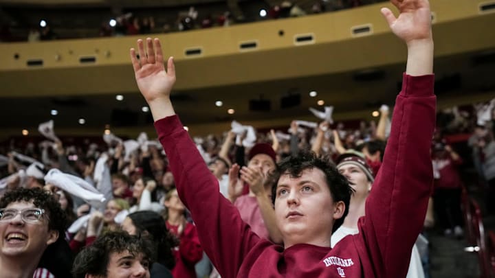 First-year Butler University student Aiden Caddell celebrates a touchdown Monday, Jan. 19, 2026, during a watch party for the College Football Playoff national championship game between the Indiana Hoosiers and the Miami Hurricanes at Simon Skjodt Assembly Hall in Bloomington, Ind.