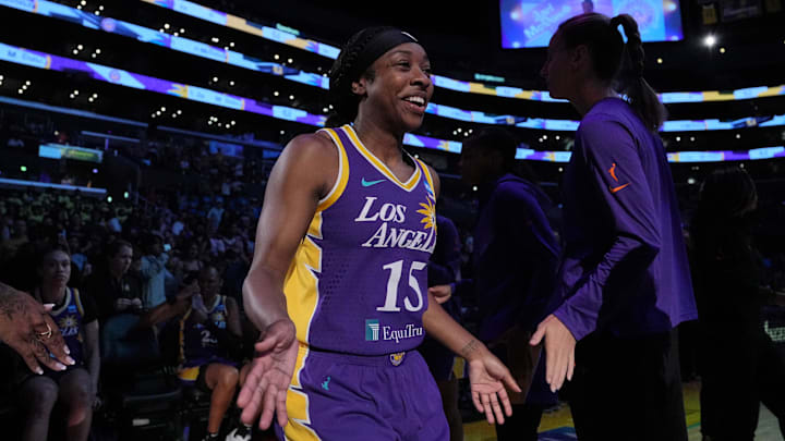 Jul 16, 2024; Los Angeles, California, USA; LA Sparks guard Aari McDonald (15) is introduced before the game against the Seattle Storm at Crypto.com Arena. Mandatory Credit: Kirby Lee-Imagn Images